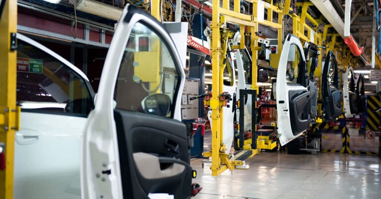Doors on car assembly line in car factory.